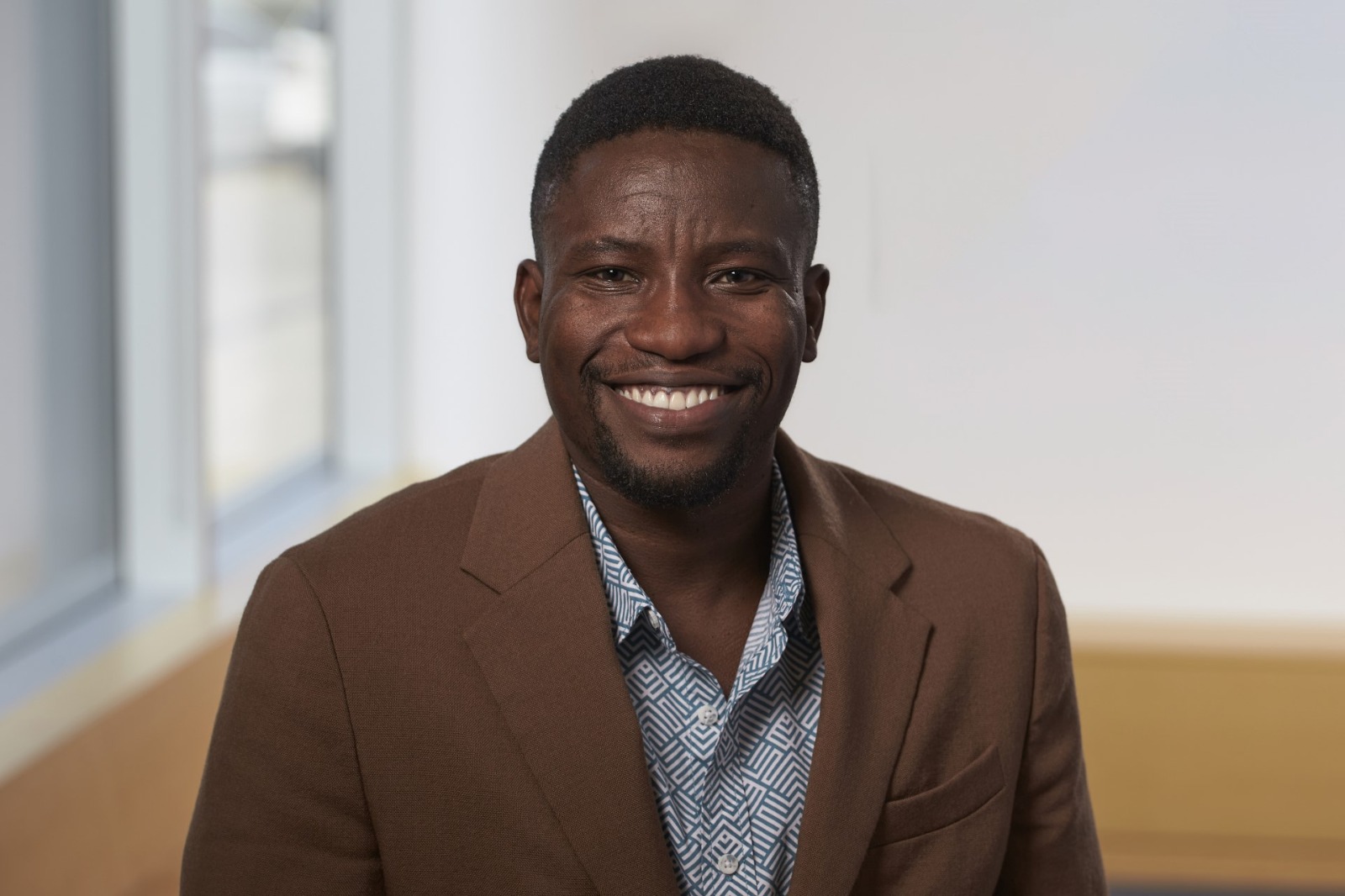 Headshot of Daniel Anyim, smiling.